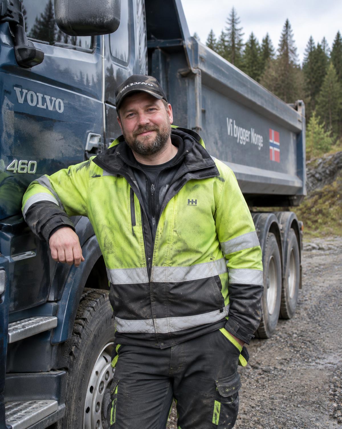 Sjåfør ved lastebilen